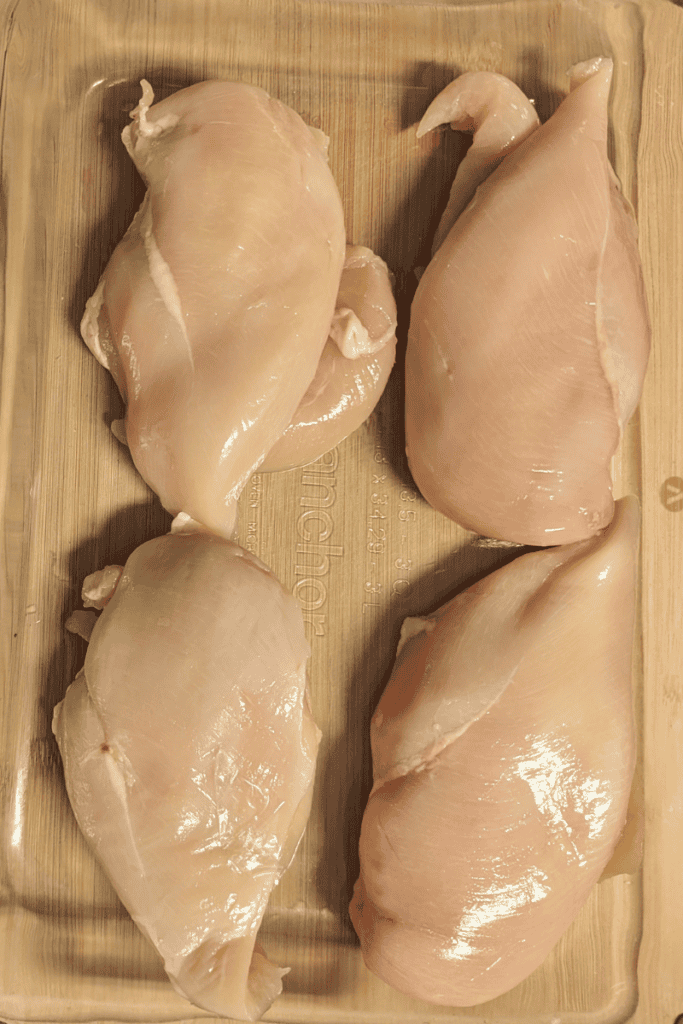 chicken breasts in baking pan