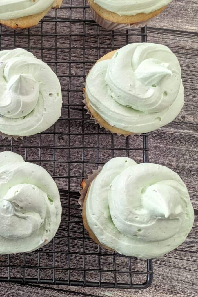frost cupcakes with pistachio frosting