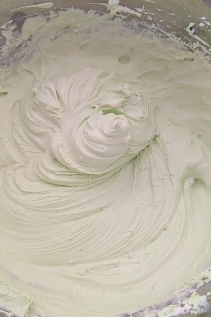 whip the frosting with whipped cream until smooth and creamy