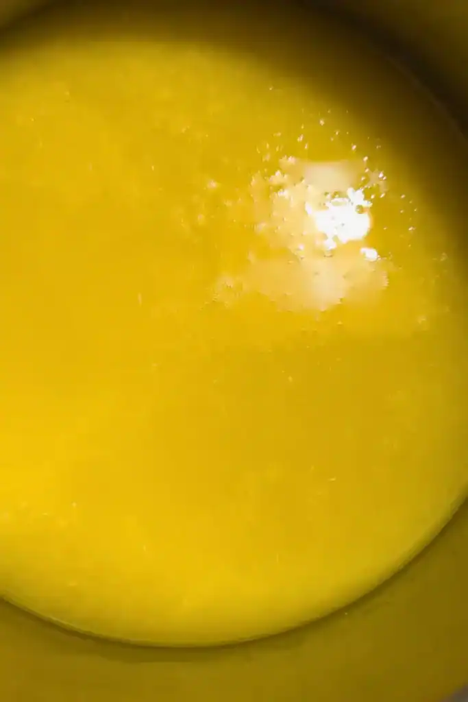 orange juice in saucepan