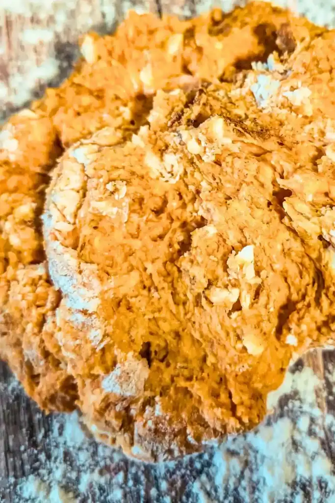 turning the pumpkin scone dough out to work on floured surface