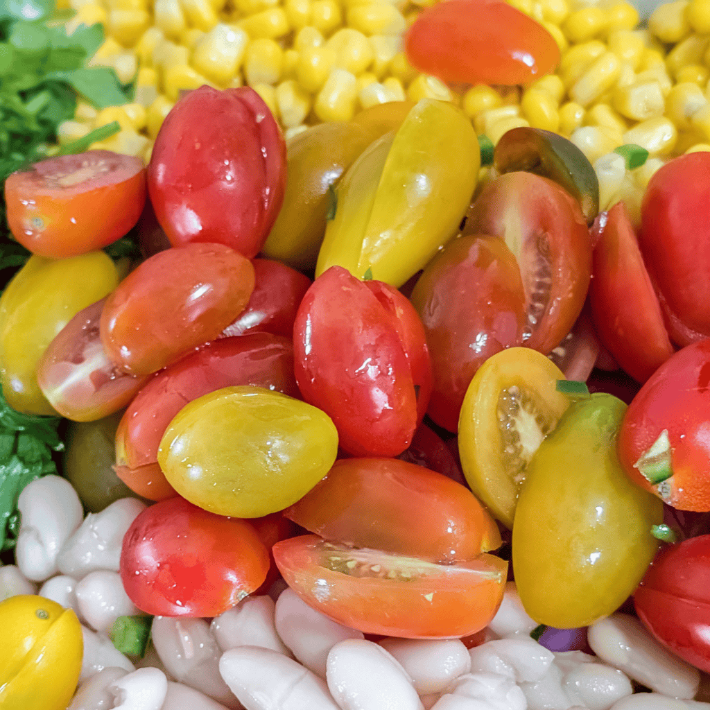 Colorful cherry tomatoes for Chipotle Southwest Chicken Salad.