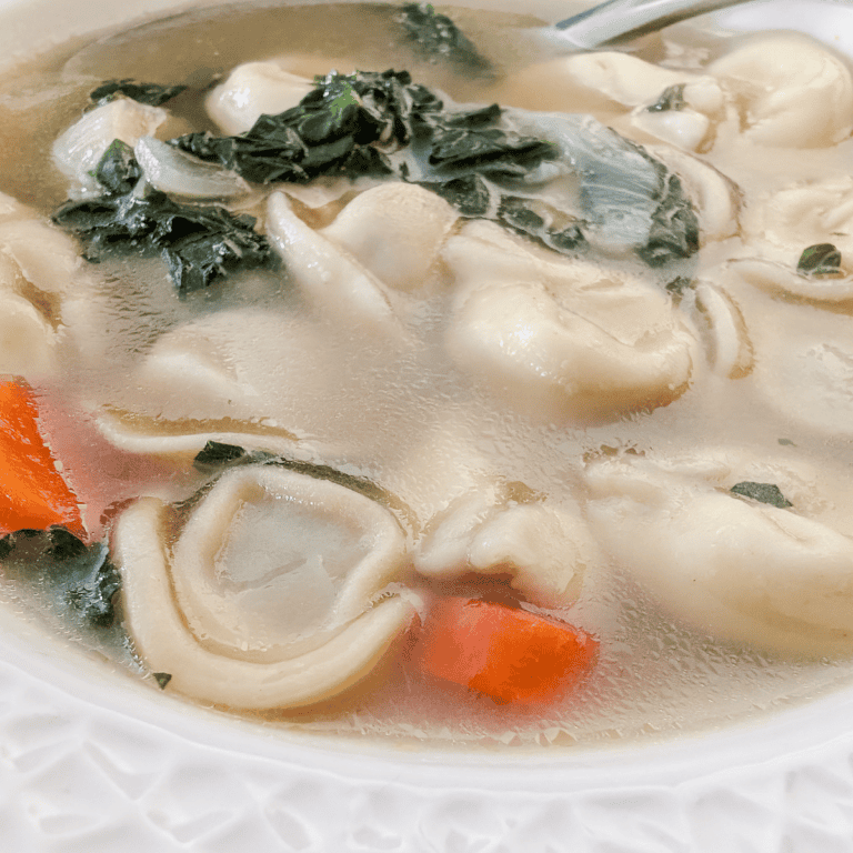 easy cappelletti soup with kale close up