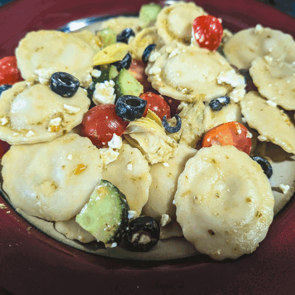 feta cheese ravioli pasta dinner with basil pesto