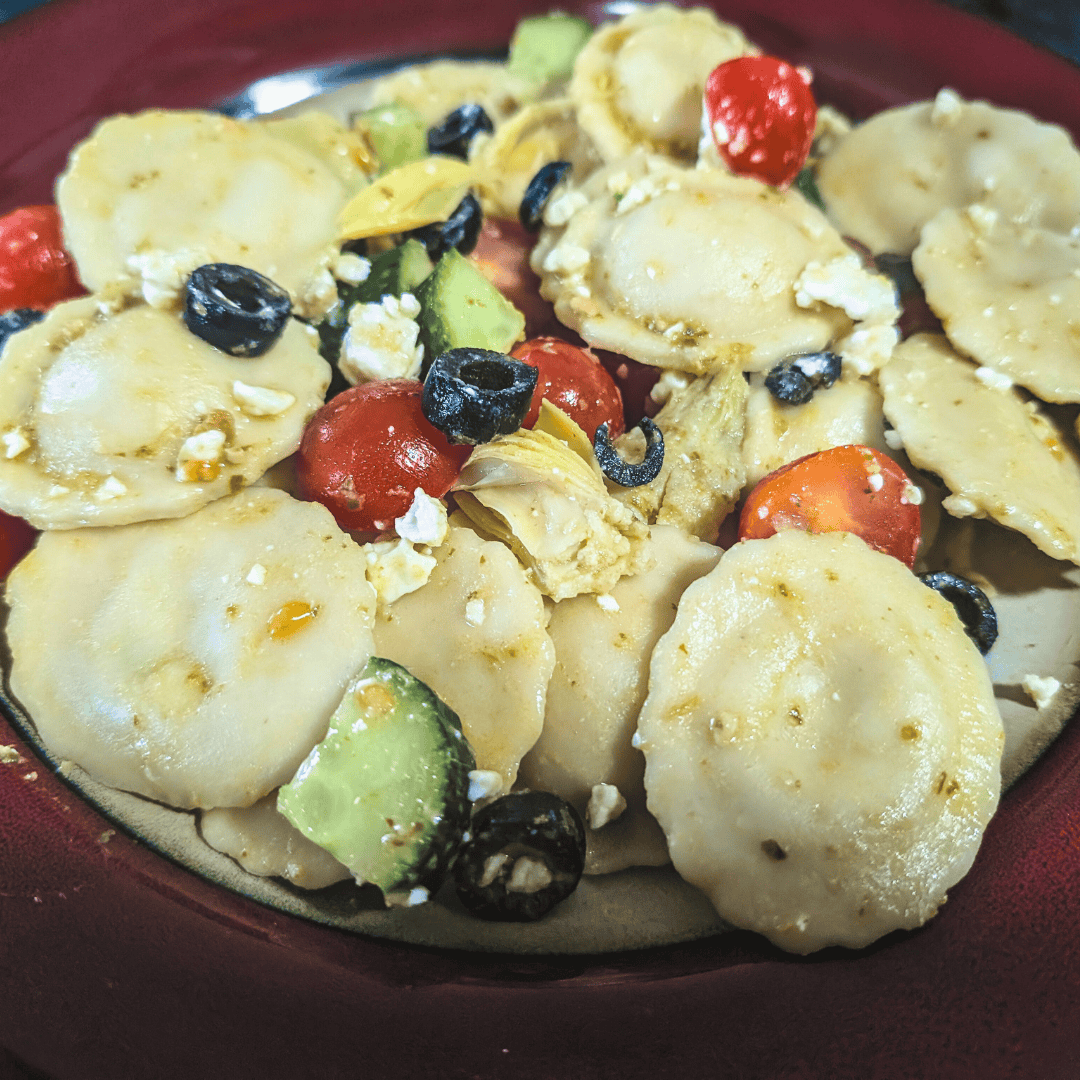 feta cheese ravioli pasta dinner with basil pesto