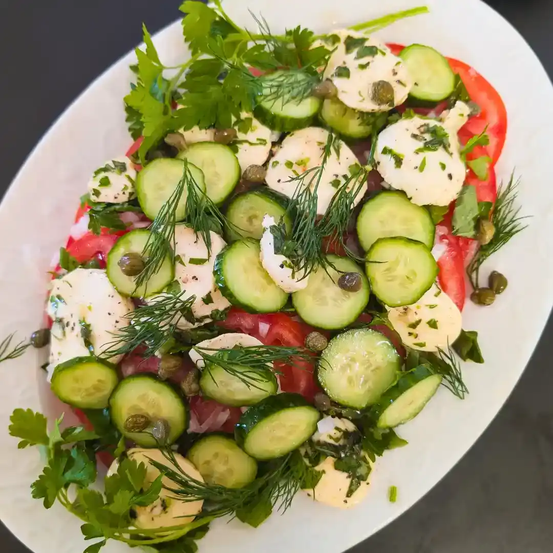 tomato cucumber salad with marinated cheese