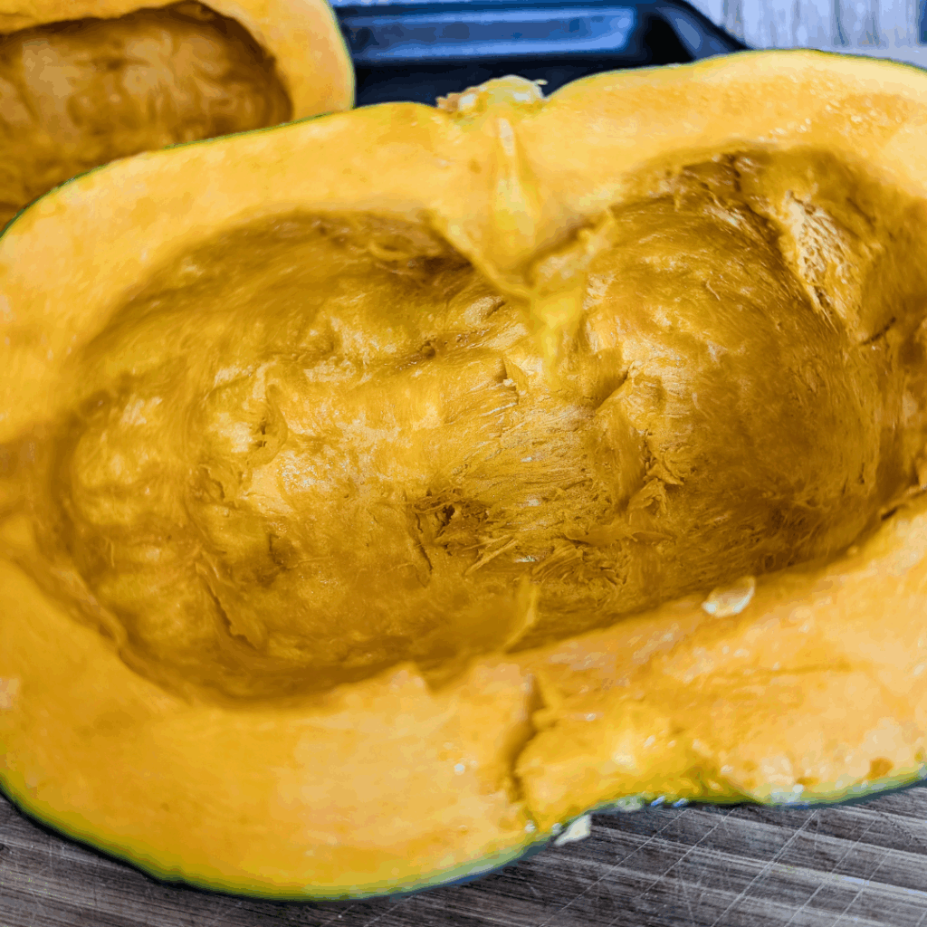 Close-up of fresh orange pumpkin flesh, ready for recipes or baking.