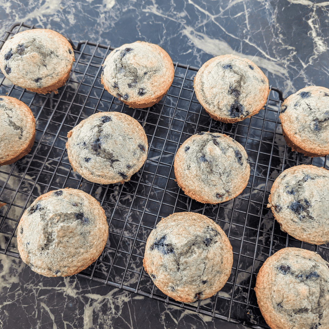 Delicious homemade blueberry muffins made with frozen Canadian wild blueberries, perfect for breakfa.